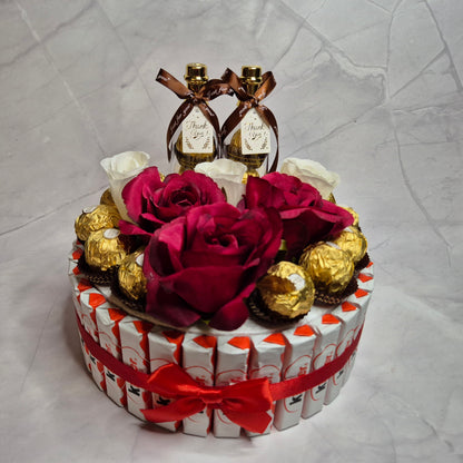 Chocolate Hamper with Rose Flowers and Lovely Bottles