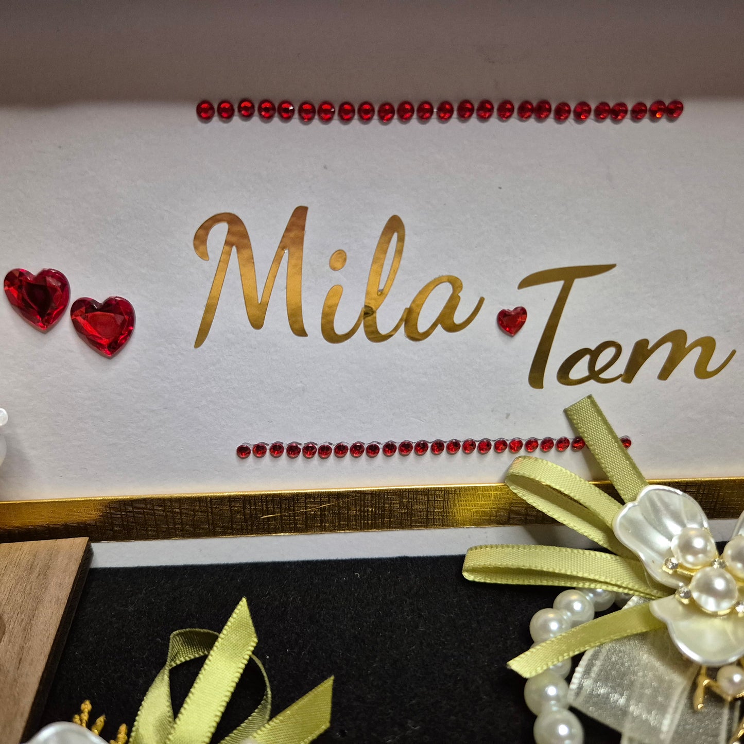 Wedding gift box with a pearl earring, pin charm, and a match corsages