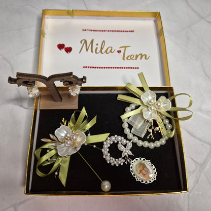Wedding gift box with a pearl earring, pin charm, and a match corsages