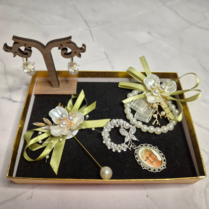 Wedding gift box with a pearl earring, pin charm, and a match corsages