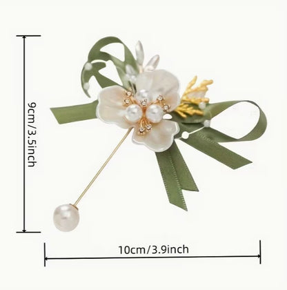 Wedding gift box with a pearl earring, pin charm, and a match corsages