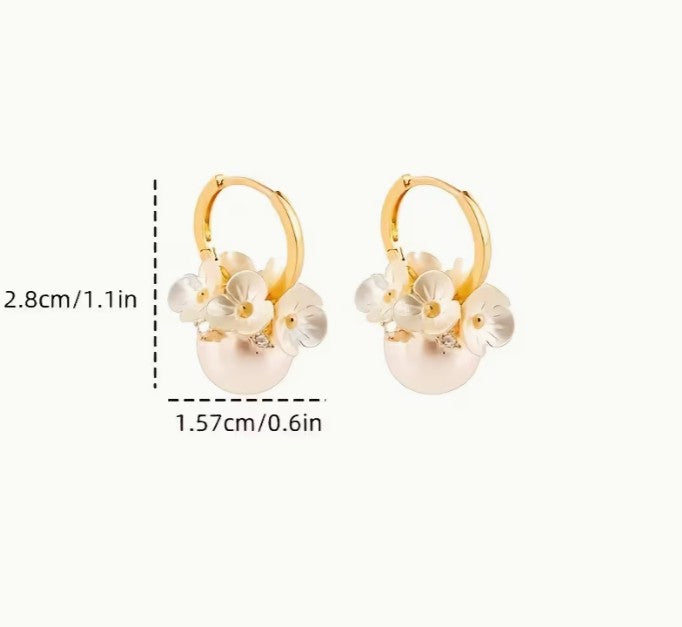 Wedding gift box with a pearl earring, pin charm, and a match corsages